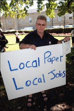 Protest over paper cuts 3