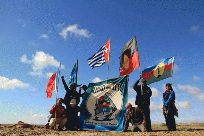 West Papuans celebrate arrival of sacred water and fire, despite intimidation by Indonesian military 3