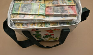 Man Charged After $580,000 Cash Seized 6